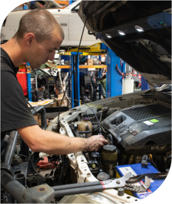 Mechanic working on engine